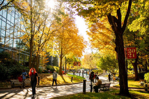 Members of the Northeastern community walk through the Boston campus. Photo by Matthew Modoono/Northeastern University