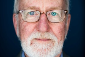 older man with white beard and glasses