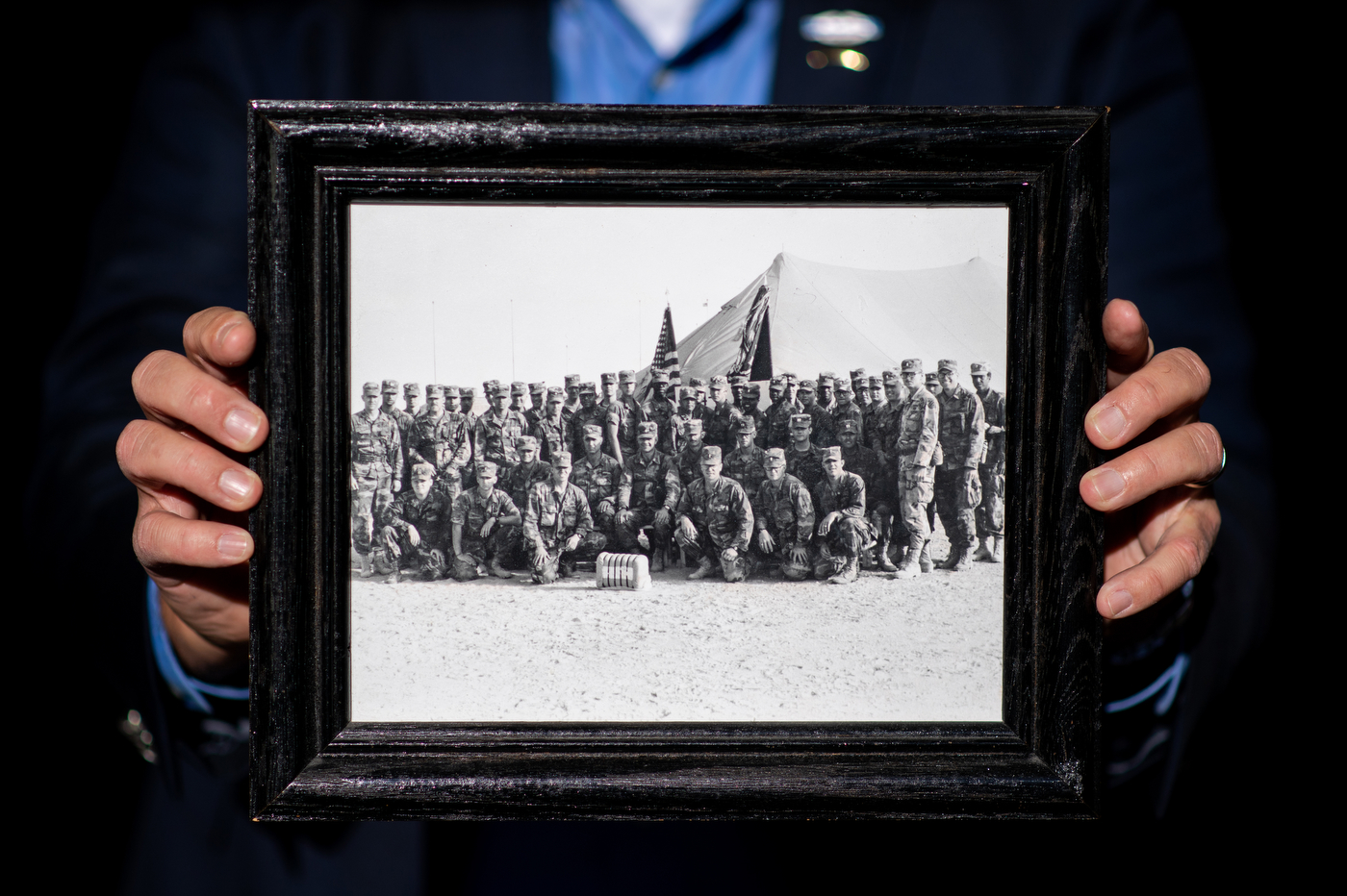 framed black and white photo of a group of infantrymen in uniform including chris dewitt