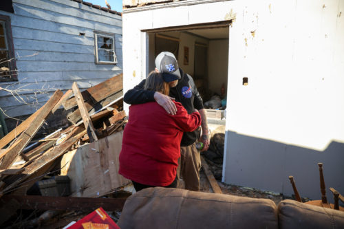 Angela Kirks and Thomas Kirks who lost their house are seen as tornado hit Mayfield, Kentucky. Photo by Tayfun Coskun/Anadolu Agency via Getty Images