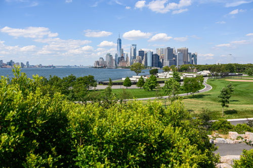 A view of downtown Manhattan as seen from Governors Island, where Northeastern University is looking to build a facility to combat climate change. Photo by Noam Galai/Getty Images