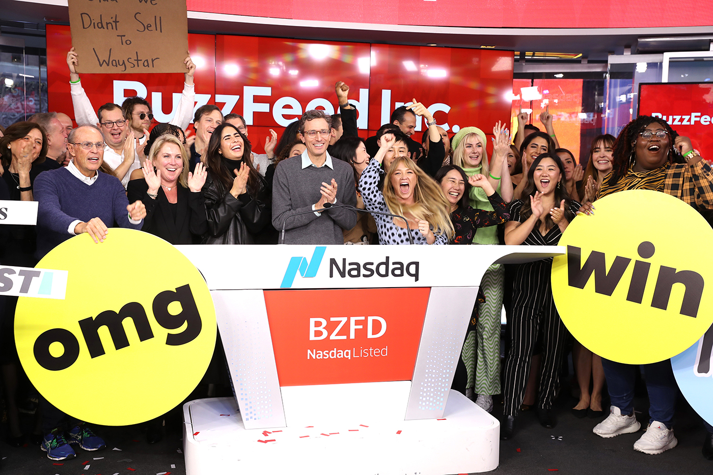 Founder and CEO of BuzzFeed Jonah H. Peretti celebrates ringing the bell with team members during BuzzFeed Inc.'s Listing Day at Nasdaq in New York City.