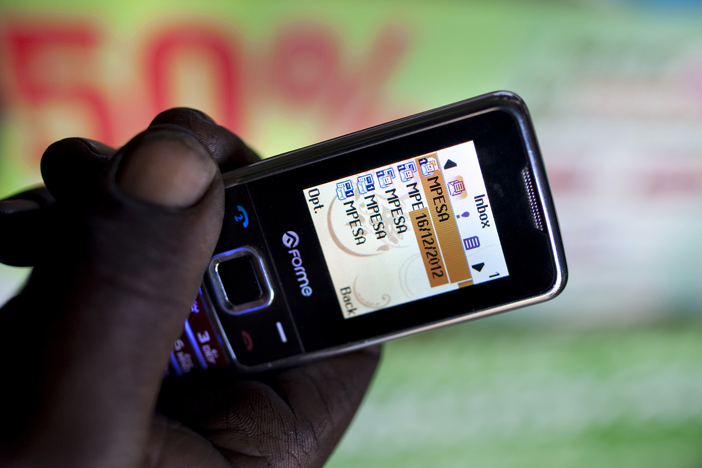 A cellphone showing texts from MPESA