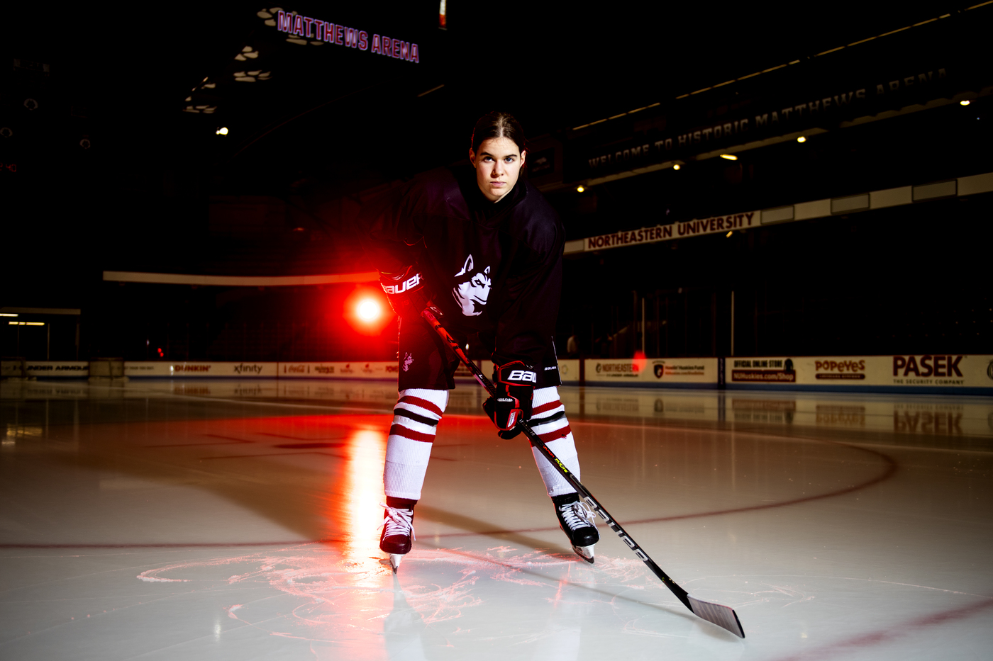 Women’s hockey player Alina Mueller poses for a portrait at Matthews Arena.