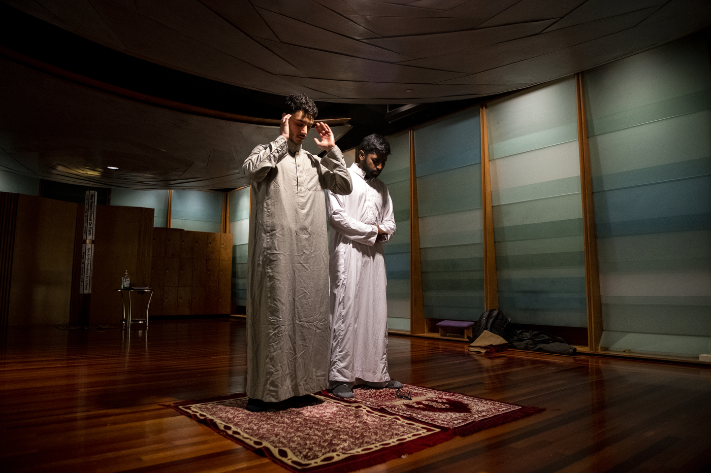 Northeastern students Omar Shoura and Shoyaib Shaik pray in the Sacred Space in Ell Hall.