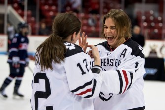 Alina Mueller and Chloé Aurard celebrate their latest Hockey East title.