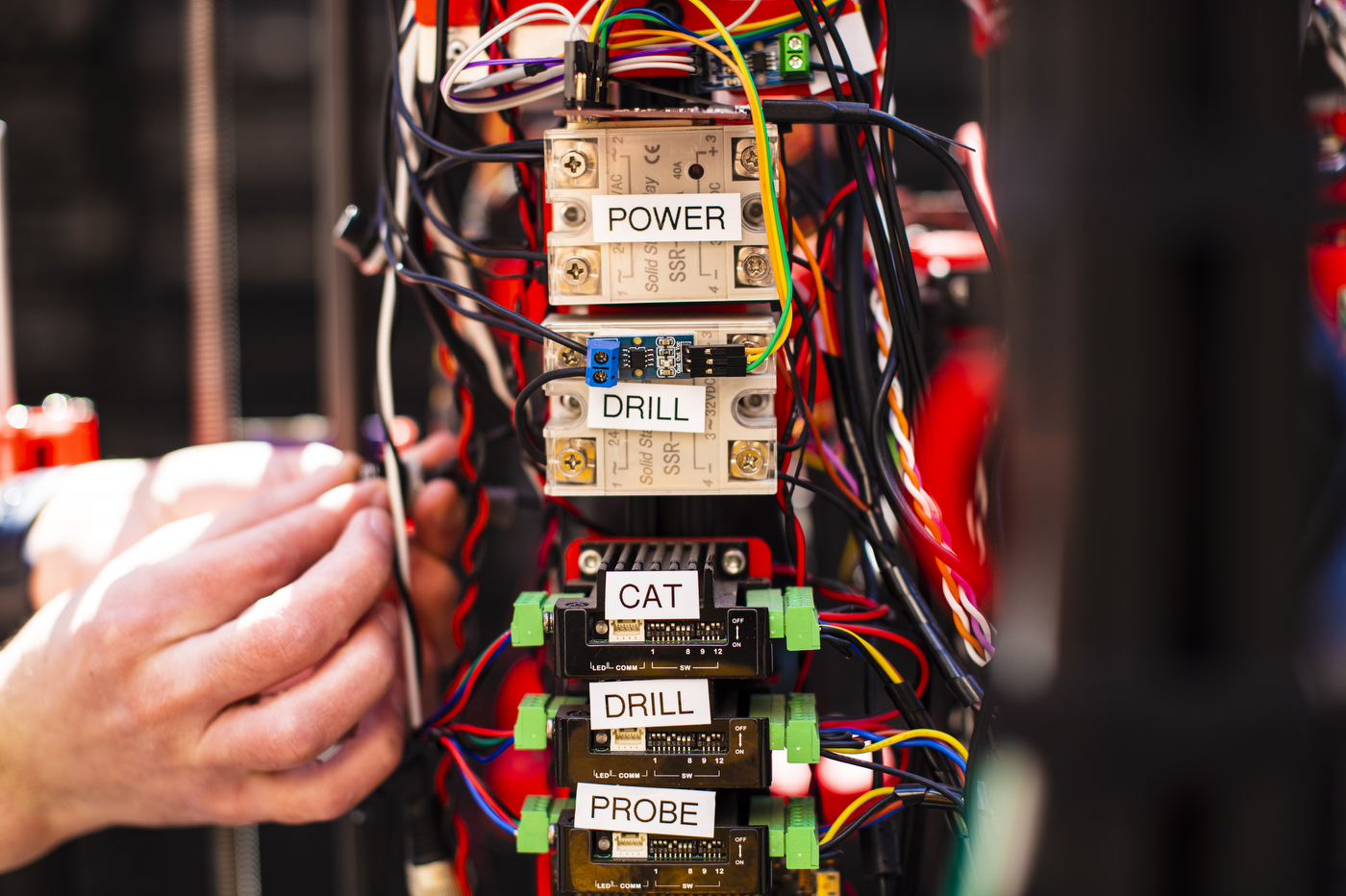 Stacks of chips, all plugged in, and labeled 'Power', 'Drill', 'Cat', 'Drill', and 'Probe'