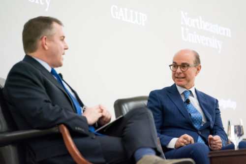 Northeastern President Joseph E. Aoun, right, speaks with <i>New York Times</i> columnist Frank Bruni on Wednesday, Jan. 31, 2018, at an event in Washington, D.C., at which the results of a Northeastern-Gallup national survey on artificial intelligence were released. <i>Photo by Erin Schaff for Northeastern University.</i>