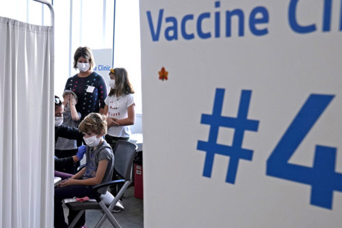 Breakthrough infections over the winter may have raised doubts about the efficacy of COVID-19 vaccines, causing the childhood vaccination rate to stall, according to a newly released survey from Northeastern and partner universities. AP Photo/Nam Y. Huh 