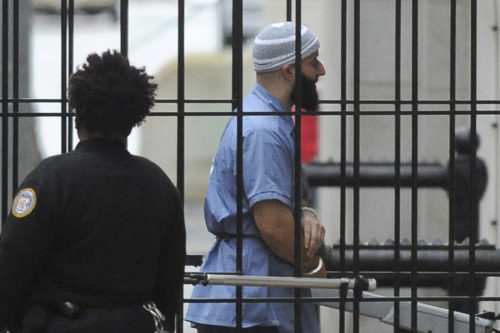 In this Feb. 3, 2016 file photo, Adnan Syed enters Courthouse East in Baltimore prior to a hearing in Baltimore.   Syed was convicted of killing his high school sweetheart. (Barbara Haddock Taylor/The Baltimore Sun via AP)