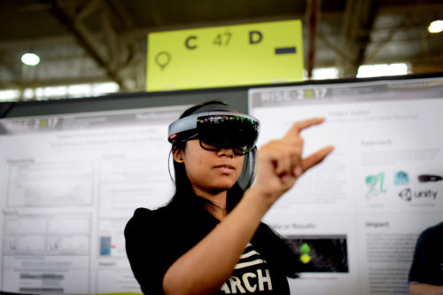 Each year, hundreds of students showcase their work to industry experts and investors at the Research, Innovation, and Scholarship Expo.
Photo by Matthew Modoono/Northeastern University