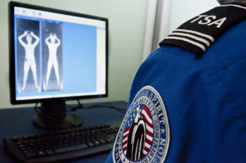 Current airport scanners require travelers to stand in an awkward, hands-over-the-head position for several seconds while they are scanned for suspicious items under their clothes. 
AP Photo/Nati Harnik