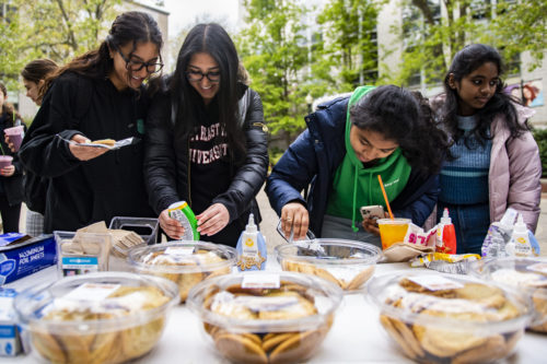 Northeastern students take a break from finals to decorate cookies with NUPD and Cooper in Snell quad. Photo by Alyssa Stone/Northeastern University