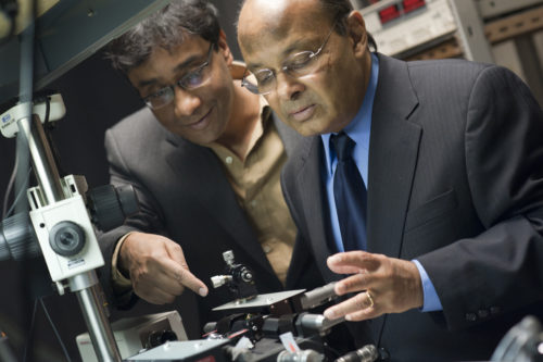 November 3, 2011 - Sri Sridhar (right), CAS Distinguished Professor of Physics and Director of the NSF Nanomedicine Science and Technology Center, and Swastik Kar (left), Assistant Professor of Physics.  The Electronic Materials Research Institute at Northeastern University has signed a three-year cooperative research agreement with the United States Army Research Laboratory, in Adelphi, Md., to design graphene-based bolometers for use in low-cost infrared imaging technology for military applications. Sridhar and Kar will collaborate on the project with Dr. Nibir Dhar and Dr. Madan Dubey of the Army Research Laboratory.  PHOTO: Mary Knox Merrill / Northeastern University