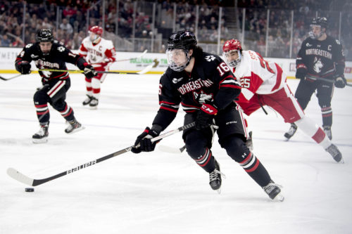 Sam Colangelo and the Huskies attack in the Beanpot title game.