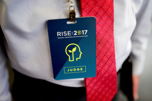 More than 120 judges from industry and academia view the hundreds of research projects on display at RISE:2017. What informs their decision-making? 
Photo by Matthew Modoono/Northeastern University