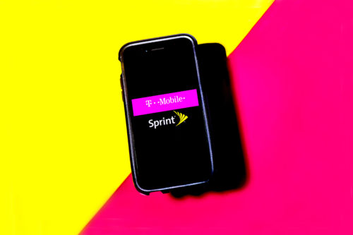 Stock photo of the T-Mobile and Sprint logo on Dec. 16, 2019. Photo by Matthew Modoono/Northeastern University