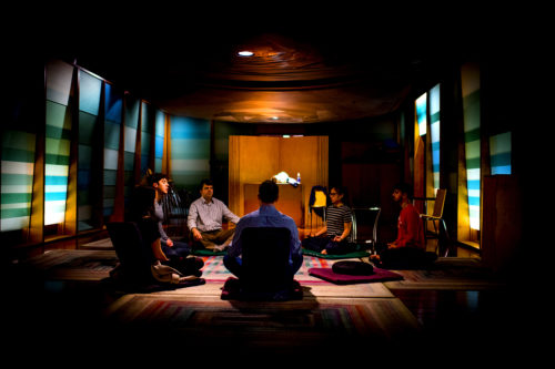 Members of the Northeastern community attend a guided meditation session held in the Sacred Space. Photo by Matthew Modoono/Northeastern University