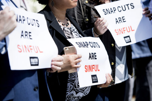 Activists urge lawmakers to reject proposed cuts to the Supplemental Nutrition Assistance Program in the Farm Bill on Monday, May 7, 2018. (Photo By Bill Clark/CQ Roll Call) (CQ Roll Call via AP Images)
