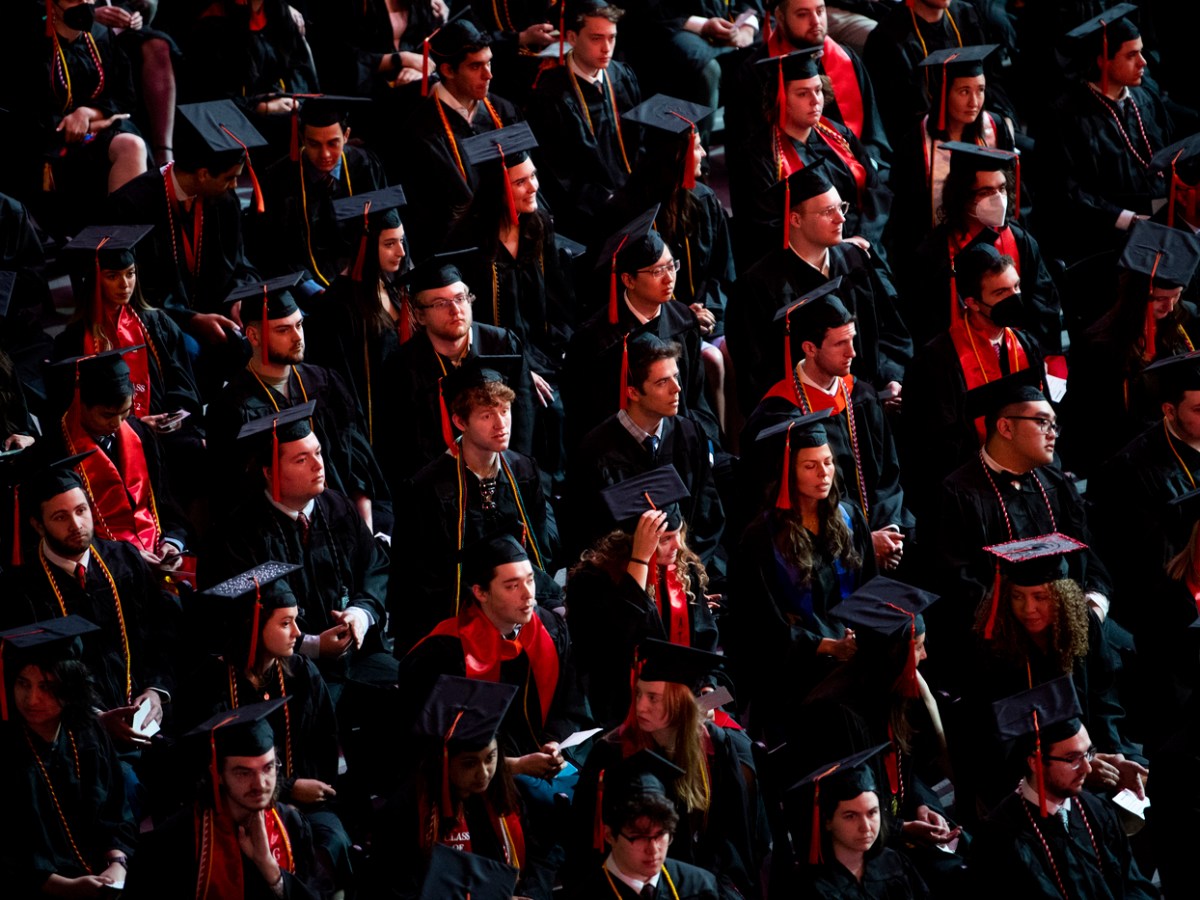 Why do grads wear caps and gowns? The meaning behind commencement regalia