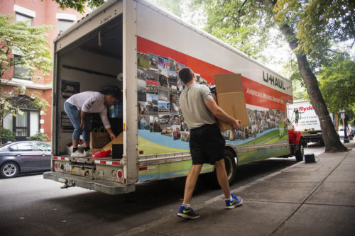 In this file photo, Michael O'Brien and Tim Duchenseau move in to off-campus housing on Gainsborough Street on Sept. 1, 2016. Photo by Adam Glanzman/Northeastern University
