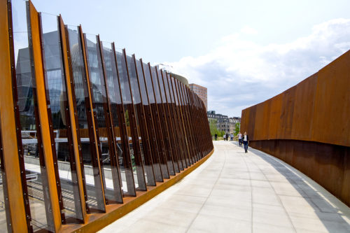 The new pedestrian bridge at Northeastern is open and will connect city neighborhoods and provide a safe route over the rail lines. Photo by Matthew Modoono/Northeastern University