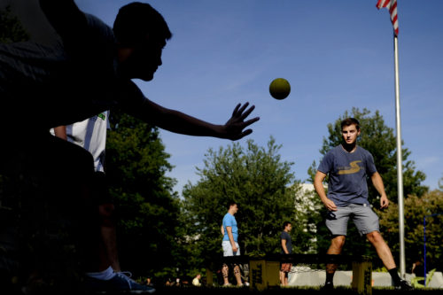 Students play Spikeball on Centennial Common at Northeastern University on Thursday. Photo by: Matthew Modoono/Northeastern University