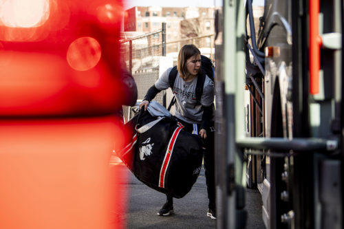 Alina Müller of the women’s hockey team loads the bus to leave for the NCAA Frozen Four tournament. Photo by Matthew Modoono/Northeastern University
