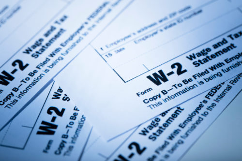 A stock photo of a W-2 IRS tax form. 