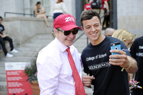 09/08/15 - BOSTON, MA. - President Joseph E. Aoun takes selfies with students following the President Convocation at Matthews Area at Northeastern University on Sept. 8, 2015. Photo by: Matthew Modoono/Northeastern University