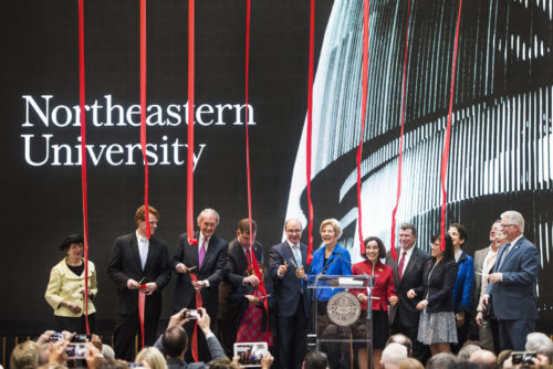 Northeastern President Joseph E. Aoun leads a ribbon cutting on Monday morning at an event to officially open the Interdisciplinary Science and Engineering Complex. <i>Photo by Adam Glanzman/Northeastern University</i>