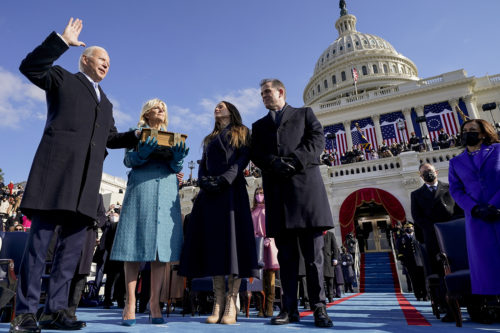 Joe Biden is sworn in as the 46th president of the United States by Chief Justice John Roberts as Jill Biden holds the Bible during the 59th Presidential Inauguration at the U.S. Capitol in Washington on Jan. 20, 2021, as their children Ashley and Hunter watch. AP Photo by Andrew Harnik, Pool
