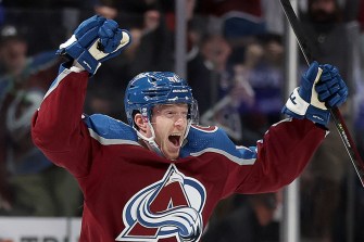 Josh Manson #42 of the Colorado Avalanche celebrates scoring the winning goal against the St Louis Blues in overtime during Game One of the Second Round of the 2022 Stanley Cup Playoffs at Ball Arena on May 17, 2022 in Denver, Colorado.