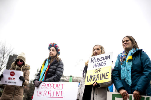 Ukrainian Cultural Club gather on Centennial Common in response to Russia invasion. Photo by Matthew Modoono/Northeastern University