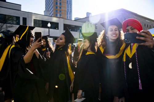 Northeastern University College of Science graduates take a selfie before entering Matthews Arena for the ceremony. Photo by Alyssa Stone/Northeastern University
