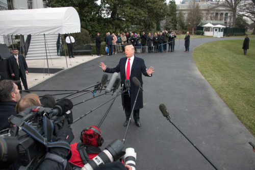 United States President Donald J. Trump makes remarks to the media as he departs the White House in Washington, DC to participate in the FBI National Academy graduation ceremony in Quantico, Virginia on Friday, December 15, 2017. Credit: Ron Sachs / CNP - NO WIRE SERVICE ' Photo by: Ron Sachs/picture-alliance/dpa/AP Images