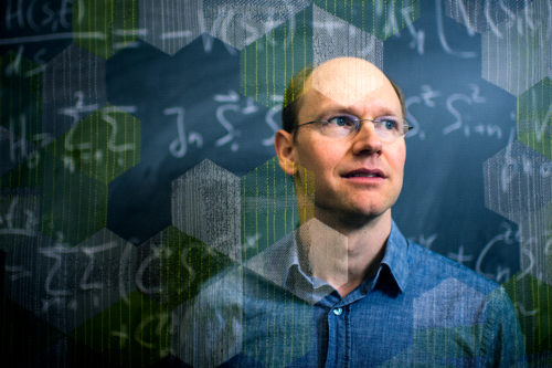 Gregory Fiete, a professor of physics at Northeastern, is leading a team of theoretical physicists who study subatomic behaviors hidden within superconductors and other rare materials that could lead to better and faster technologies based on quantum physics. Photo by Matthew Modoono/Northeastern University