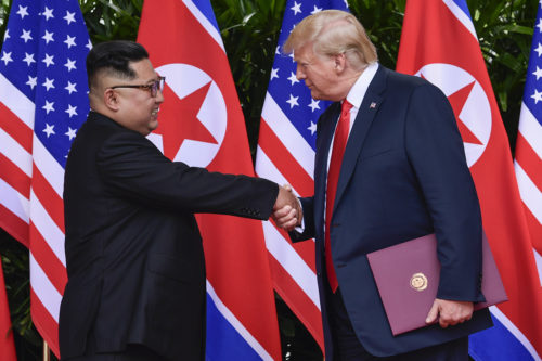North Korean leader Kim Jong Un and U.S. President Donald Trump shake hands at the conclusion of their meetings at the Capella resort on Sentosa Island on Tuesday, June 12, 2018 in Singapore. (AP Photo/Susan Walsh, Pool)