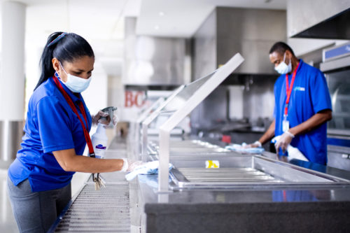 Members of the Northeastern facilities team sanitize and clean the International Village Dining facility. Photo by Ruby Wallau/Northeastern University