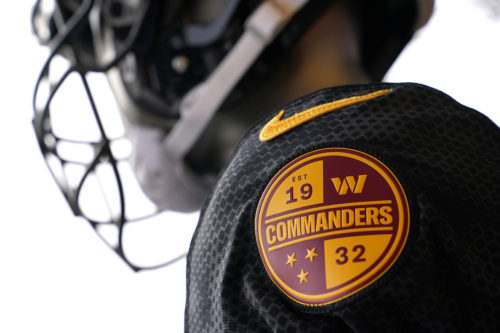 A Washington Commanders jersey is displayed at an event to unveil the NFL football team's new identity. AP Photo/Patrick Semansk