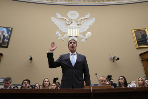Michael Cohen, President Donald Trump's former personal lawyer, is sworn in to testify before the House Oversight and Reform Committee on Capitol Hill in Washington on Wednesday, Feb. 27, 2019. (AP Photo/J. Scott Applewhite)
