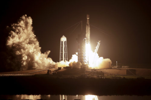 A SpaceX Falcon heavy rocket lifts off from pad 39A at the Kennedy Space Center in Cape Canaveral, Fla., early Tuesday, June 25, 2019. The Falcon rocket has a payload military and scientific research satellites. AP Photo/John Raoux