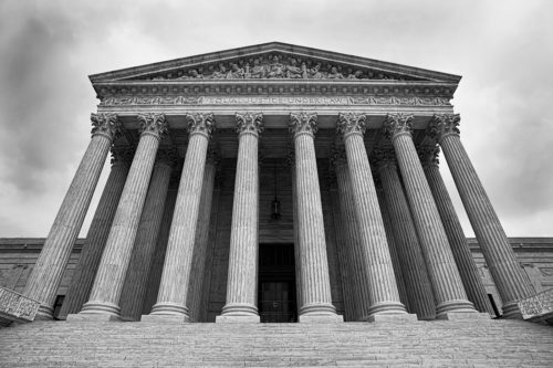 In a number of major Supreme Court cases this term, Northeastern legal scholars say Justice Anthony Kennedy is likely to tip the scales one way or the other. Photo via iStock