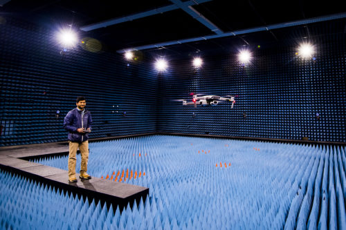 Engineering graduate student Mithun Diddi flies a drone in the Unmanned Aircraft Systems facility at the George J. Kostas Research Institute for Homeland Security in Burlington, Massachusetts on March 8, 2019 Photo by Adam Glanzman/Northeastern University