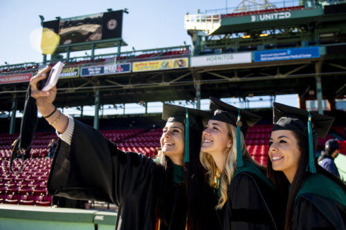 Northeastern University celebrates its undergraduate and graduate 2021 Commencement ceremonies at Boston's Historic Fenway Park on May 8th & 9th. Speakers included Joseph E. Aoun, president of Northeastern, a distinguished group of influential figures as well as student speakers. Photo by Ruby Wallau/Northeastern University