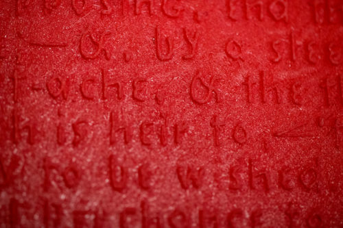 Northeastern, Harvard Library, the Boston Public Library, and the Perkins School for the Blind are hosting an exhibition to celebrate the multi-sensory experiences of reading. The exhibit features 3D printed replicas of early 19th and 20th century texts designed for readers who are visually impaired. Photo by Matthew Modoono/Northeastern University