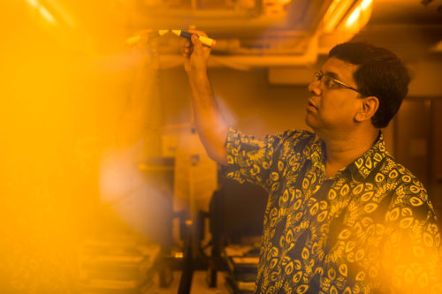Professor Auroop Ganguly works in his lab in the Forsythe Building on September 20, 2018. Photo by Adam Glanzman/Northeastern University