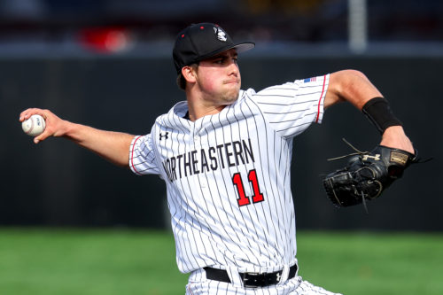 Eric Yost throws a pitch for Northeastern.
