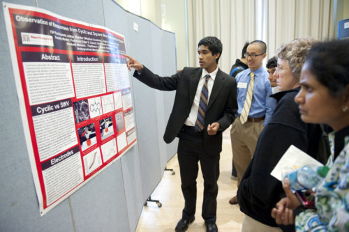August 3, 2011 - Aditya Shankar from Westford Academy explains his poster at the STEM Young Scholars Program poster session, Curry Student Center Ballroom   PHOTO: Christopher Huang / Northeastern University