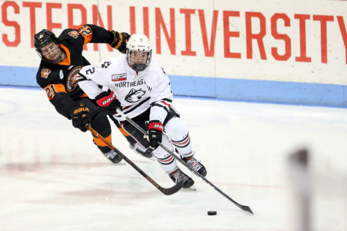 Jordan Harris, who plays defense for the men’s hockey team at Northeastern, started 39 games in his first season for the Huskies, scored 13 points, and helped the red and black win a Hockey East championship. Photo by Jim Pierce/Northeastern Athletics